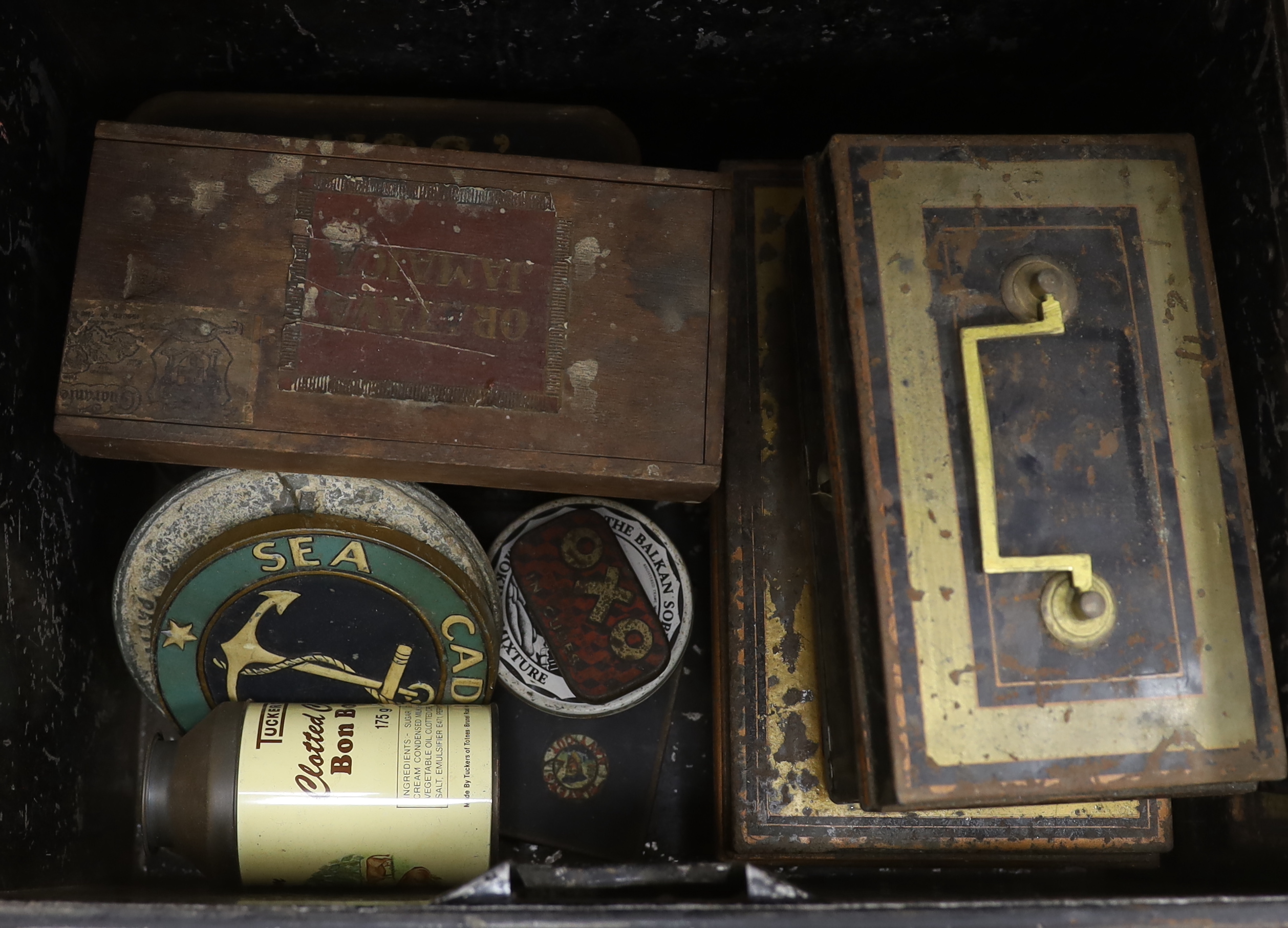 A collection of early to mid century and 20th century tins, a ladies tea disc, a sea cadet corps disc/badge